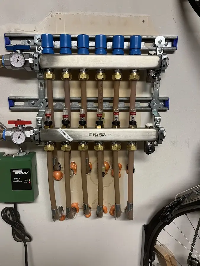 Plumber performing Gas Line Installation at a residential property in Lacombe